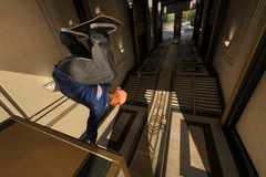 A skater performs a handstand on a ramp in Skate.